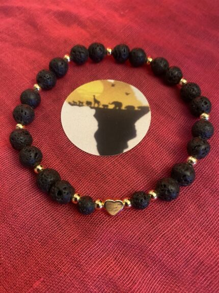 Embrace the Rugged Beauty of black Lava Stone and 14K Gold Bracelet