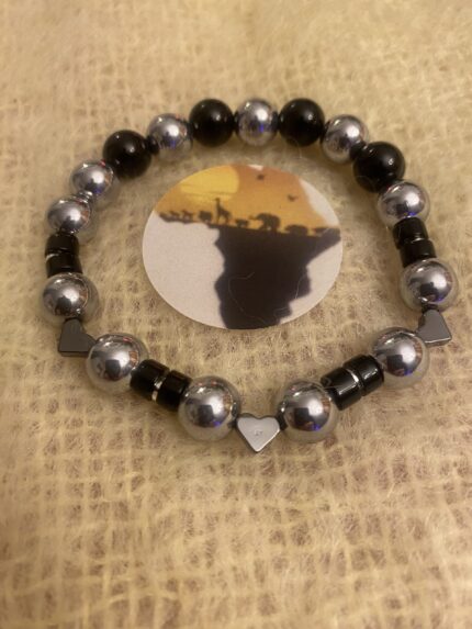 Embrace Timeless Elegance with this Onyx and Silver Bracelet!