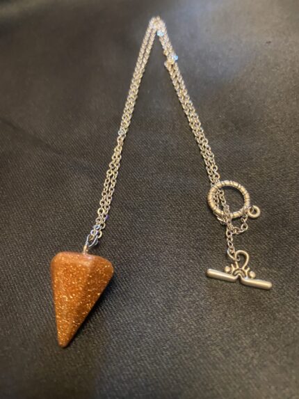 Tap into Cosmic Energy with This Shimmering Bohemian Pendulum Necklace