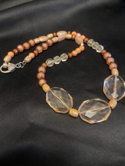 Earth's Embrace: A Bohemian Necklace of Warmth and Wonder